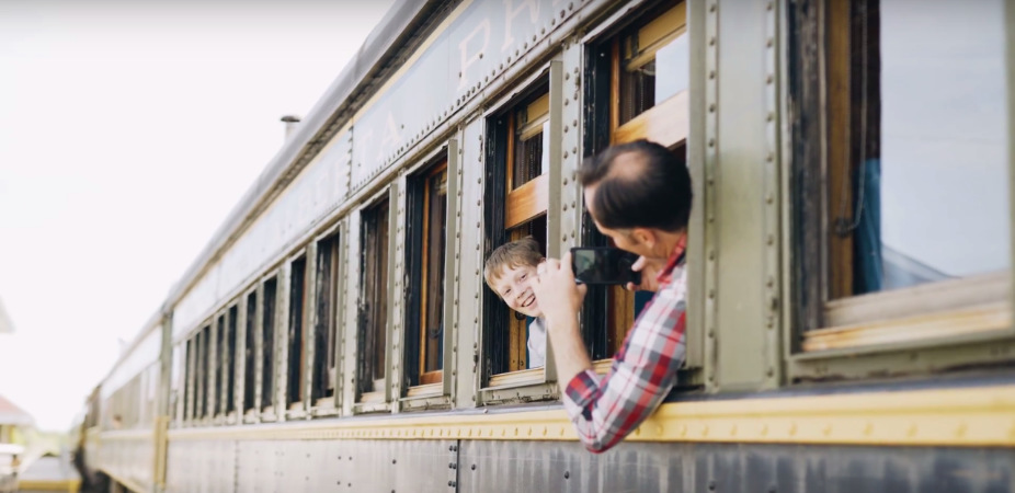 Father and son on train in Stettler