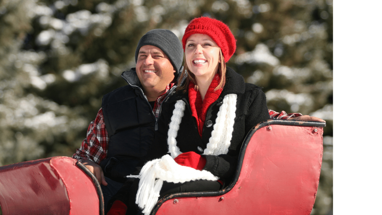 Couple on a winter sleigh ride